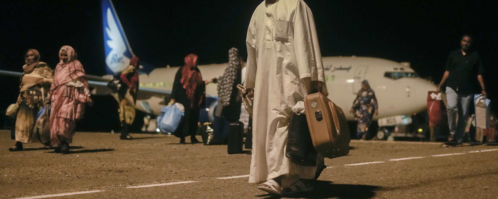 Sudanese, who had been stranded in Jeddah, Saudi Arabia, arrive at Port Sudan airport, Thursday, May 11, 2023.  - Sputnik Africa, 1920, 03.11.2023