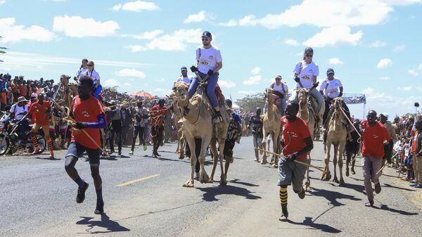 Participants compete in a amateur camel race at the Maralal International Camel Derby at Samburu, Northern Kenya Saturday, Oct. 7, 2023. - Sputnik Africa