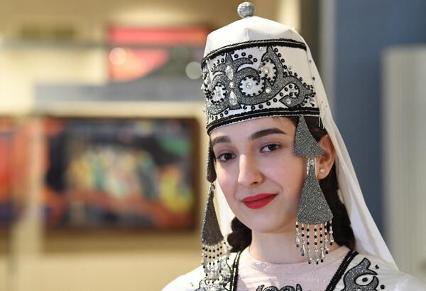 The International RUSSIA EXPO Forum and Exhibition. A representative of the Karachay-Cherkess Republic wearing ethnic clothes at the Russia: Closer to the East exhibition in Pavilion No.13, Museum of the East. - Sputnik Africa