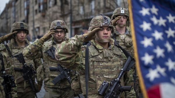 Members of the U.S. Army attend a military parade ceremony marking the 104th anniversary of the Lithuanian military on Armed Forces Day at the Gedimino Avenue, in Vilnius, Lithuania, Wednesday, Nov. 23, 2022 - Sputnik Africa