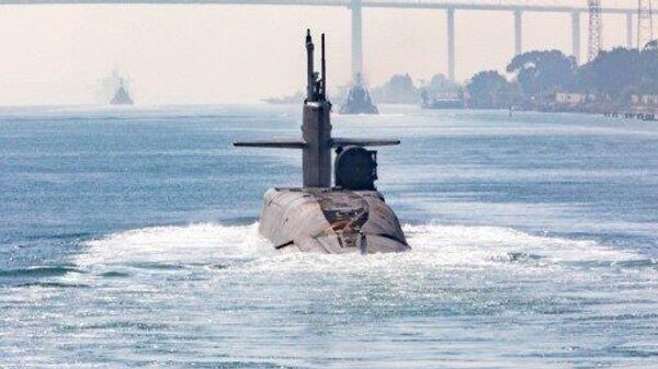 Ohio-class guided-missile sub sailing through the Suez Canal. Note the dry deck jutting out the sub's right side, which denotes its status as a guided-missile sub, rather than the Ohio class's ballistic missile sub variant. - Sputnik Africa