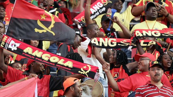 Fans of Angola cheer prior to the Group D match between Angola and Portugal at the soccer World Cup 2006 at World Cup Stadium in Cologne, Germany, Sunday, June 11, 2006.  - Sputnik Africa