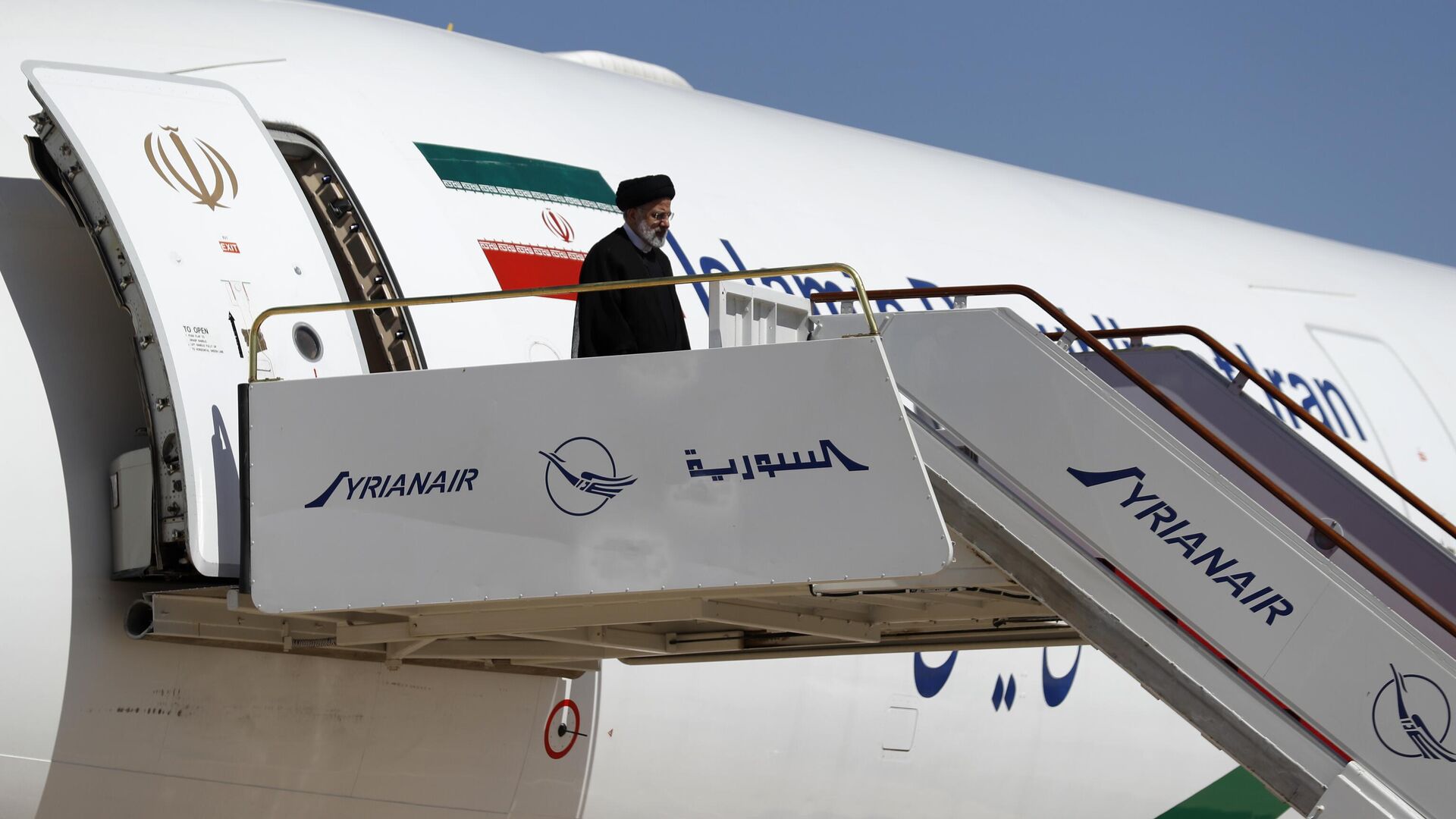 Iranian President Ebrahim Raisi steps off the plane as he arrives to the airport in Damascus, Syria, Wednesday, May 3, 2023. - Sputnik Africa, 1920, 11.11.2023