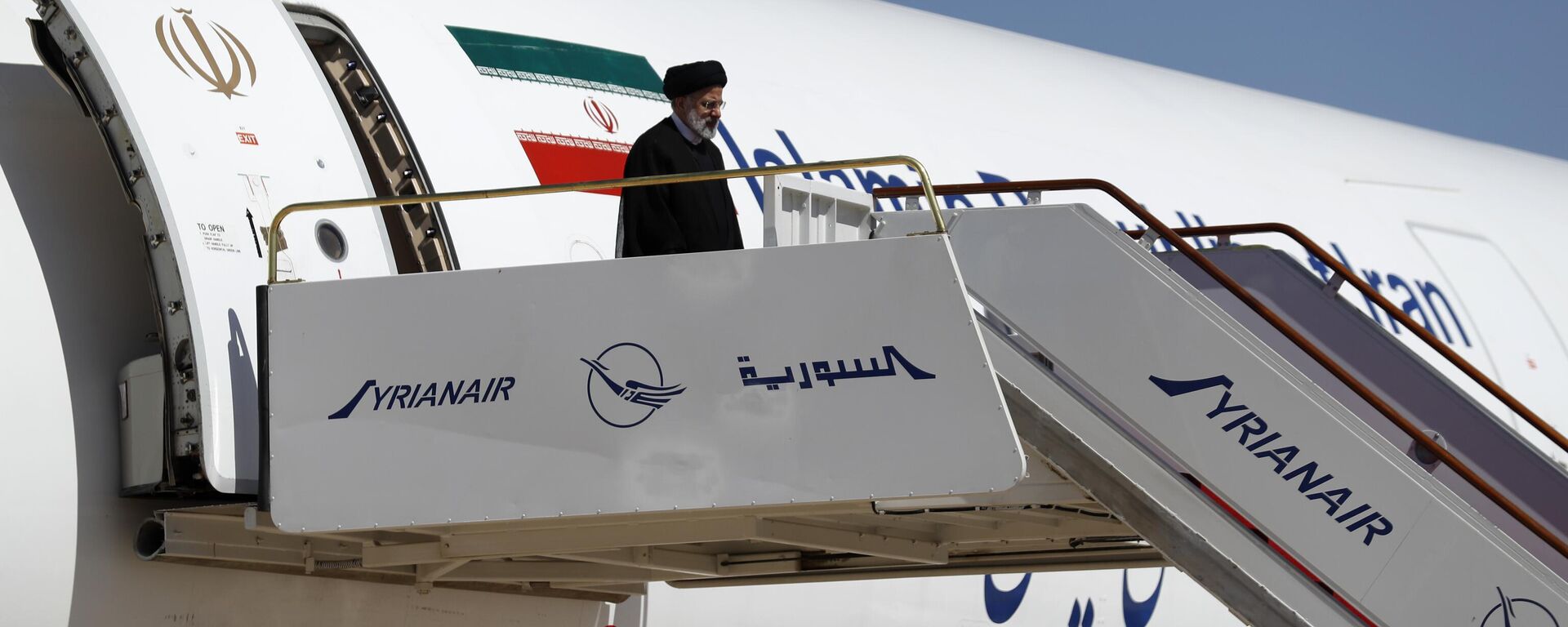 Iranian President Ebrahim Raisi steps off the plane as he arrives to the airport in Damascus, Syria, Wednesday, May 3, 2023. - Sputnik Africa, 1920, 11.11.2023