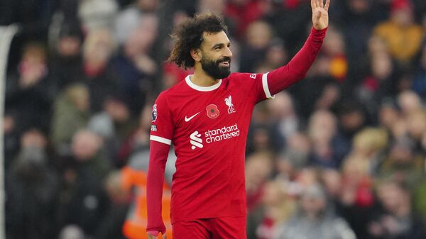 Liverpool's Mohamed Salah celebrates scoring his side's 2nd goal during the English Premier League soccer match between Liverpool and Brentford at Anfield stadium in Liverpool, England, Sunday, Nov. 12, 2023. - Sputnik Afrique