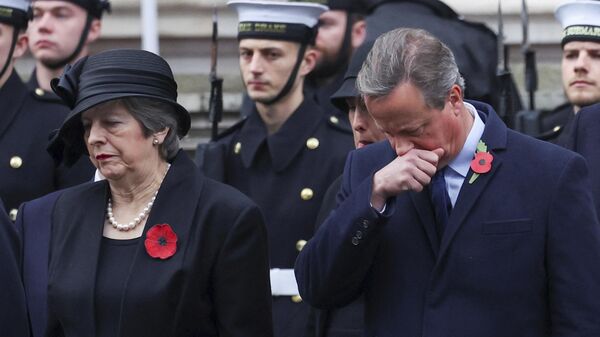 British former Prime Ministers Theresa May and David Cameron attend the annual Remembrance Sunday ceremony at the Cenotaph in London, Sunday, Nov. 12, 2023 - Sputnik Africa