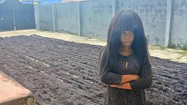 Helen Williams who set a new world record for the longest wig in November, 2023. - Sputnik Africa