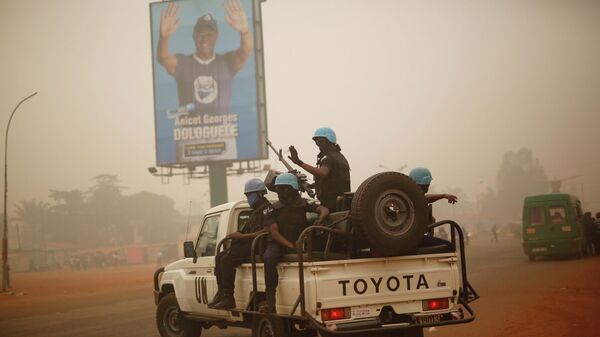 In this Feb. 12 2016 file photo, UN forces from Rwanda patrol the streets of Bangui, Central African Republic.  - Sputnik Africa
