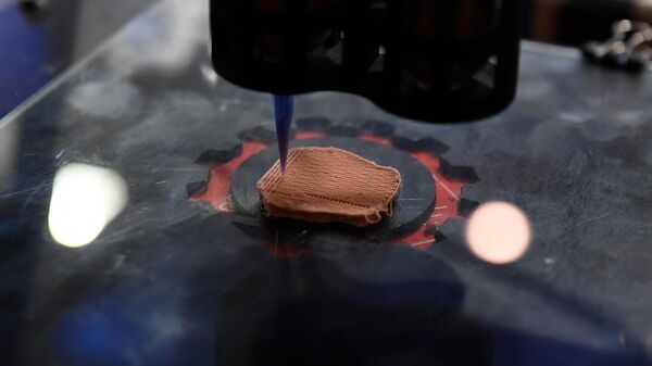 A NOVAMEAT synthetic 3D-printer prints plant-based proteins that can mimic the texture of beef at the Mobile World Congress (MWC) fair in Barcelona on June 30, 2021 - Sputnik Africa