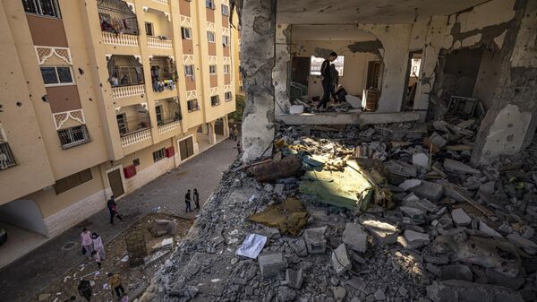 Immeuble touché par une frappe israélienne sur la bande de Gaza
 - Sputnik Afrique