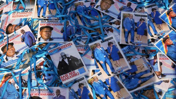 Supporters of Felix Tshisekedi sell souvenirs outside his party headquarters in Kinshasa, Democratic Republic of the Congo, Wednesday Jan. 23, 2019.  - Sputnik Africa
