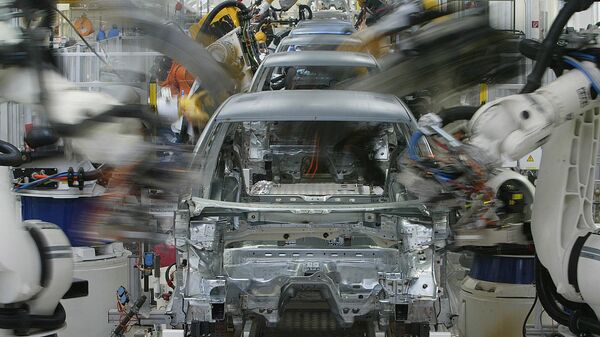 Welding-robots at a Golf V (fifth generation Golf ) carbody in a production-line at the plant of German carmaker Volkswagen in Wolfsburg, northern Germany, pictured on Tuesday, Feb.24, 2004.  - Sputnik Africa