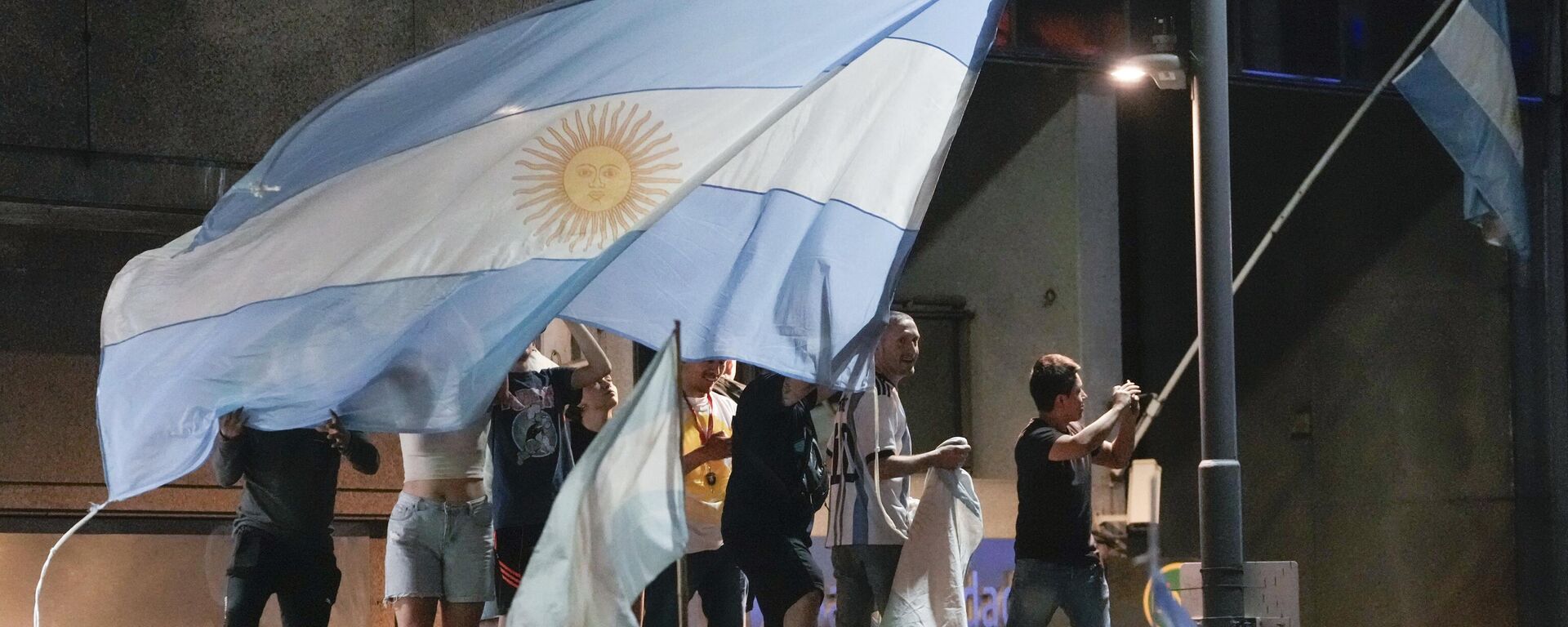 Supporters of Javier Milei celebrate his victory over Sergio Massa, the Economy Minister and candidate of the Peronist party, in the presidential runoff election in Buenos Aires, Argentina, Sunday, Nov. 19, 2023.  - Sputnik Africa, 1920, 23.11.2023