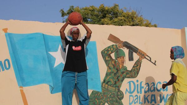 In this photo taken Tuesday, March 6, 2012, Somali female basketball players train at the Hamar Jajab stadium in Mogadishu, Somalia. - Sputnik Africa