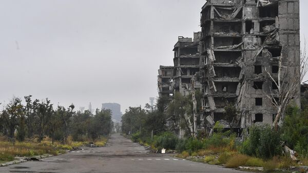 Destroyed buildings near the Vladimir Boyko stadium in Mariupol, Russia. - Sputnik Africa
