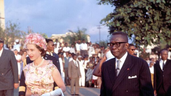 Britain's Queen Elizabeth II walks with President William Tubman of Liberia after her arrival in Monrovia, Nov. 23. 1961.  - Sputnik Africa