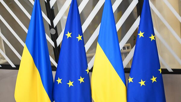 State flags of Ukraine and flags with symbols of the European Union during the European Union summit in Brussels. - Sputnik Africa