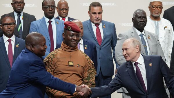 July 28, 2023, Russian President Vladimir Putin during a joint photograph with the heads of delegations participating in the II Russia-Africa Summit in St. Petersburg. - Sputnik Africa