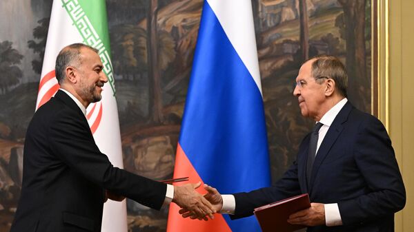 Iranian Foreign Minister Hossein Amir-Abdollahian and Russian Foreign Minister Sergey Lavrov attend a signing ceremony following their meeting in Moscow, Russiam on December 5, 2023. - Sputnik Africa
