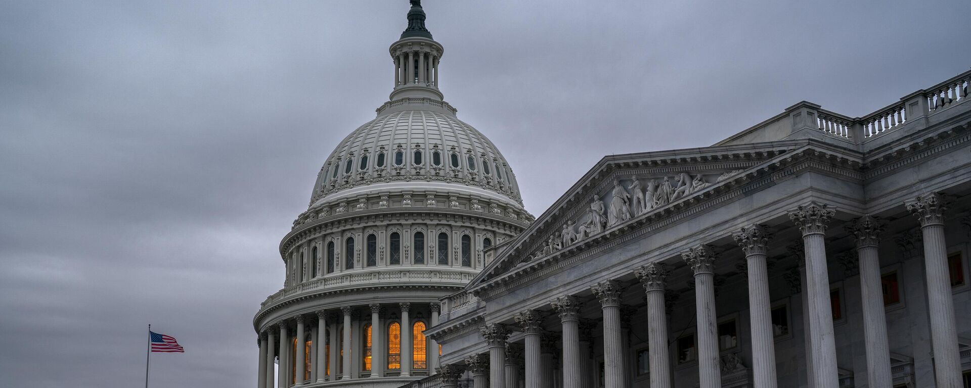 The Senate side of the Capitol is seen in Washington, early Thursday, Dec. 22, 2022, as lawmakers rush to complete passage of a bill to fund the government before a midnight Friday deadline, at the Capitol in Washington, Thursday, Dec. 22, 2022. - Sputnik Africa, 1920, 16.04.2024