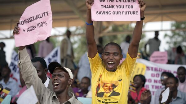 Ugandans supportive of their government's anti-gay stance attend a march and rally organized by a coalition of Ugandan religious leaders and government officials, at the Kololo Independence Grounds in Kampala, Uganda, Monday, March 31, 2014.  - Sputnik Africa