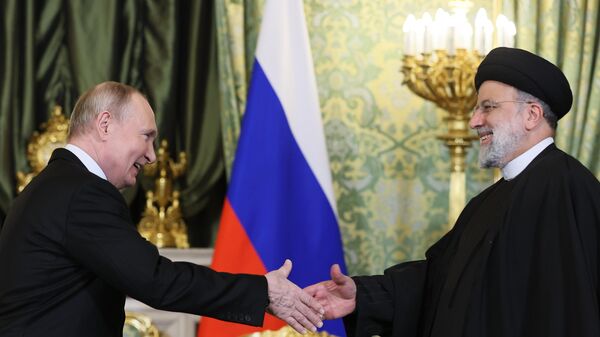 December 7, 2023. Russian President Vladimir Putin and Iranian President Ebrahim Raisi (right) during a meeting in Moscow. - Sputnik Africa