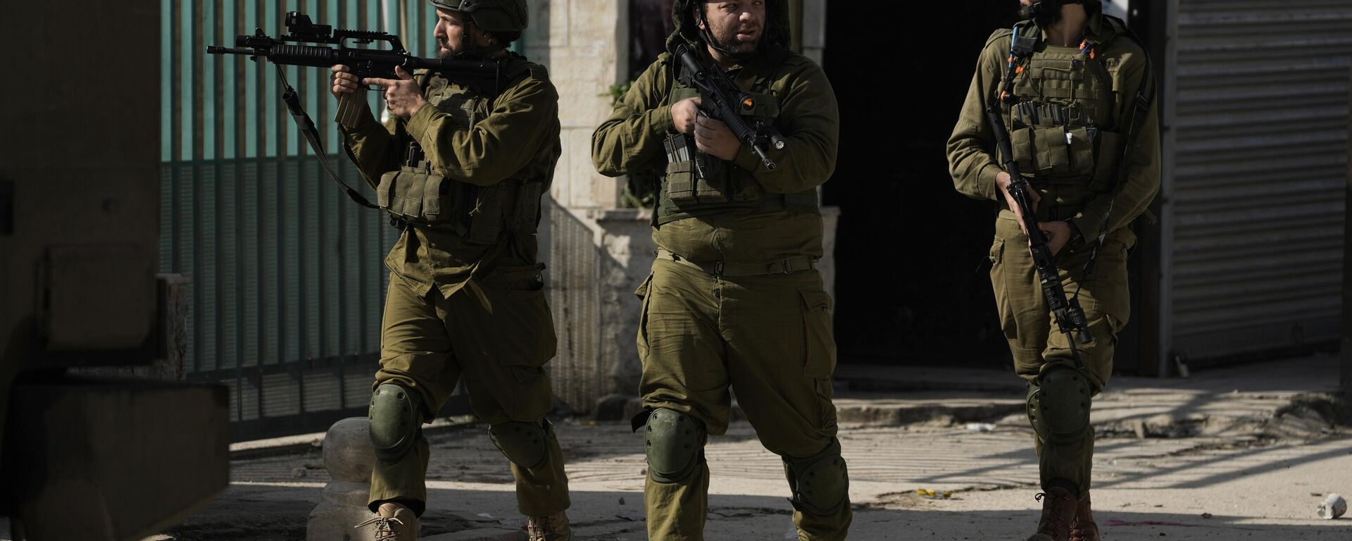 Israeli soldiers are seen during an army operation, in the Jenin refugee camp, West Bank, Tuesday, Dec. 12, 2023.  - Sputnik Africa, 1920, 28.01.2024