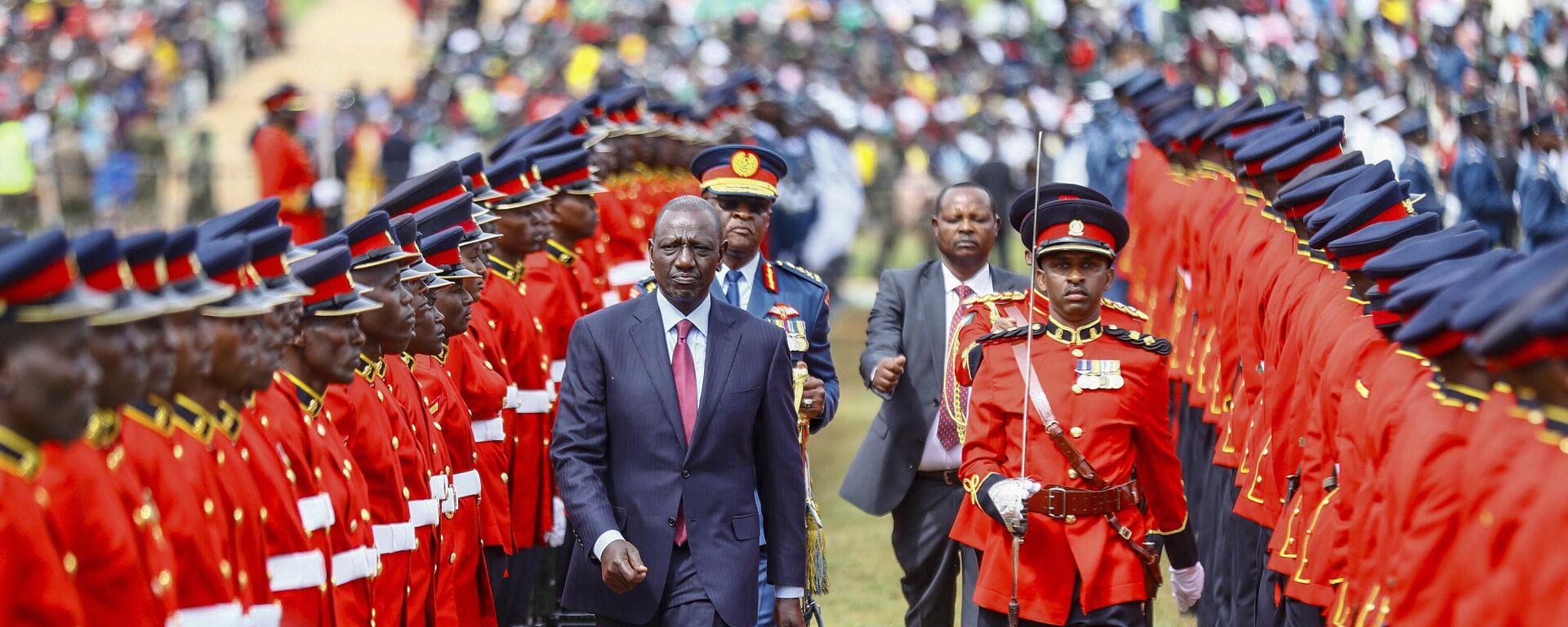 Kenyan President William Ruto, center left, inspects a guard of honor parade, during the 60th Jamhuri Day Celebrations (Independence Day) at Uhuru gardens Stadium in Nairobi, Tuesday, Dec. 12, 2023.  - Sputnik Africa, 1920, 12.12.2023