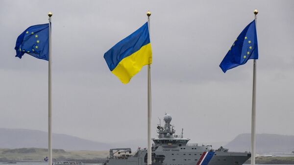 An Icelandic coast guard ship sails in front of EU and Ukraine flags flying in front of the Harpa Concert hall on May 16, 2023 in Reykjavik, Iceland, the venue of the 4th Summit of the Heads of State and Government of the Council of Europe, on the eve of the two-day summit. - Sputnik Africa