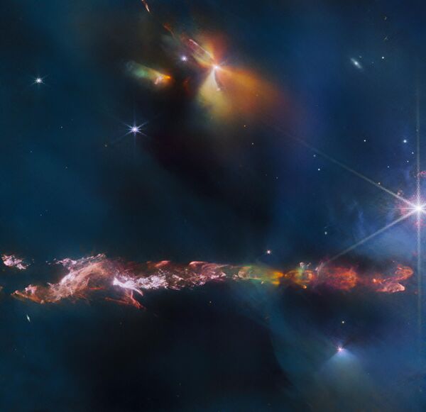 The NASA/ESA/CSA James Webb Space Telescope reveals intricate details of the Herbig Haro object 797 (HH 797). Herbig-Haro objects are luminous regions surrounding newborn stars (known as protostars), and are formed when stellar winds or jets of gas spewing from these newborn stars form shockwaves colliding with nearby gas and dust at high speeds. - Sputnik Africa