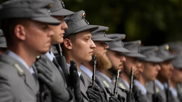 German 'Gebirgsjaeger' mountain troops Bundeswehr soldiers take part in an oath-taking ceremony in Munich, Germany, Thursday, Sept. 14, 2023. - Sputnik Afrique