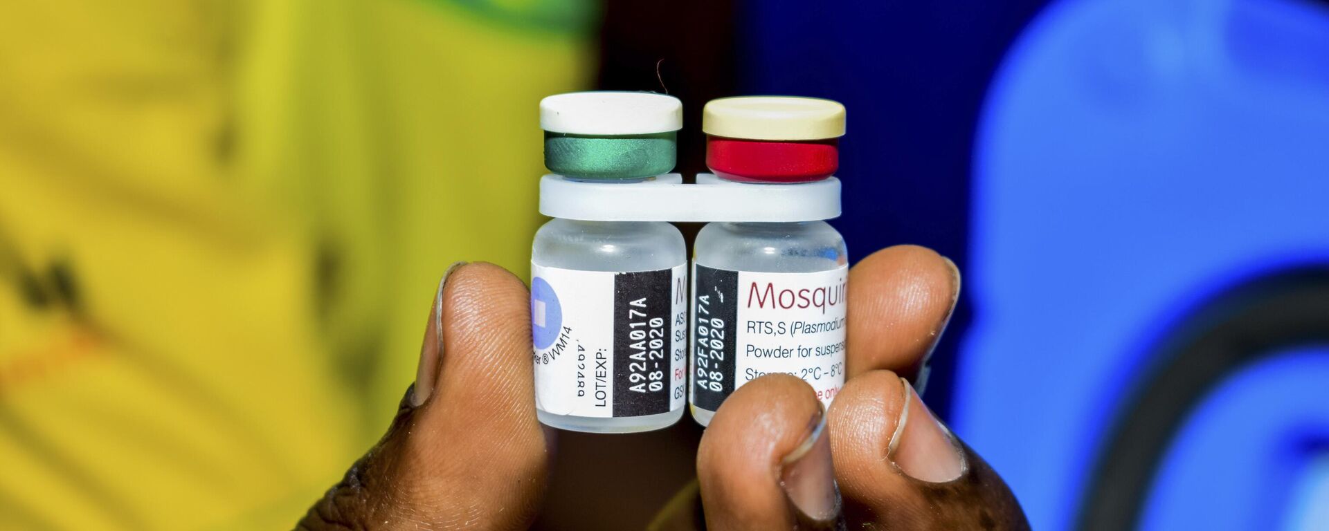 A health worker displays the new malaria vaccine in Homabay County, western Kenya, Friday, Sept. 13, 2019  The vaccine is the world's first for malaria and has been rolled out in Kenya, Ghana, and Malawi by the World Health Organisation/ - Sputnik Africa, 1920, 21.12.2023