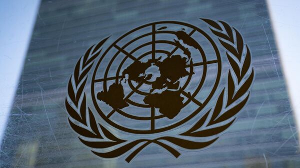 The symbol of the United Nations is displayed outside the Secretariat Building, Feb. 28, 2022 - Sputnik Africa
