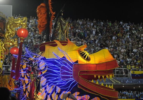A float of Uniao da Ilha samba school representing a dragon parades during the second night of carnival parade at the Sambadrome in Rio de Janeiro on February 20, 2012.  - Sputnik Africa