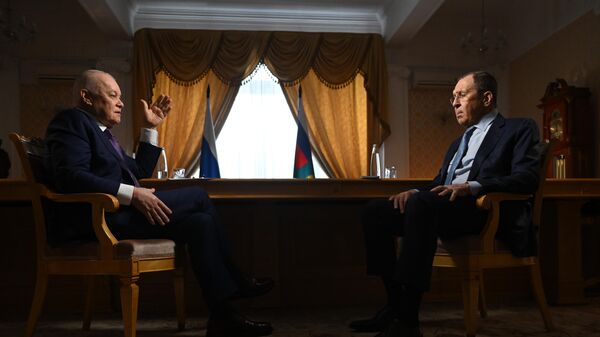 Russian Foreign Minister Sergey Lavrov, right, during an interview with Dmitry Kiselyov, director general of the Rossiya Segodnya media group.  Russian Foreign Minister Sergey Lavrov interviewed by Rossiya 24 and Sputnik. - Sputnik Africa