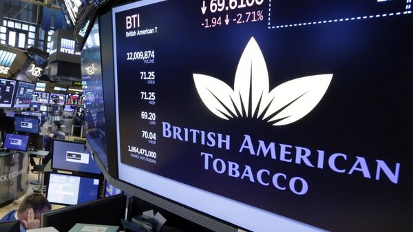 File photo of the logo for British American Tobacco appears above a trading post on the floor of the New York Stock Exchange - Sputnik Africa