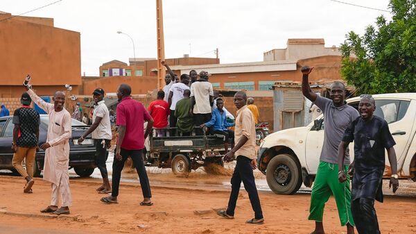 Nigerien men gather for an anti-French protest in Niamey, Niger, Friday, Aug. 11, 2023. - Sputnik Africa