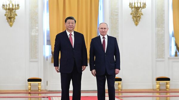 Russian President Vladimir Putin's meeting with Chinese counterpart Xi Jinping in Moscow. File photo - Sputnik Africa
