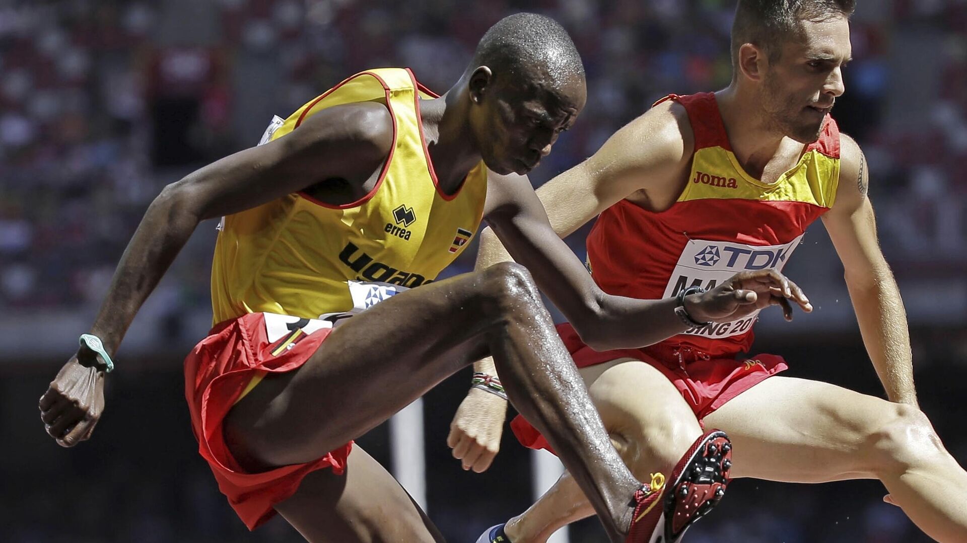 Uganda's Benjamin Kiplagat, front, competes in round one of the men's 3000m steeplechase during the World Athletic Championships at the Bird's Nest stadium in Beijing - Sputnik Africa, 1920, 01.01.2024
