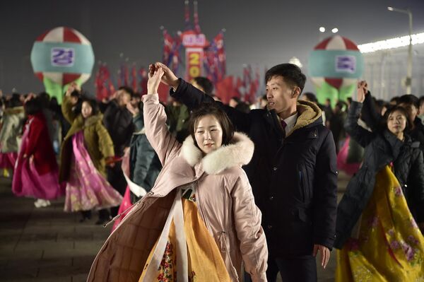 Youth and students take part in celebrations to welcome in the new year at Kim Il Sung Square in Pyongyang on December 31, 2023.  - Sputnik Africa