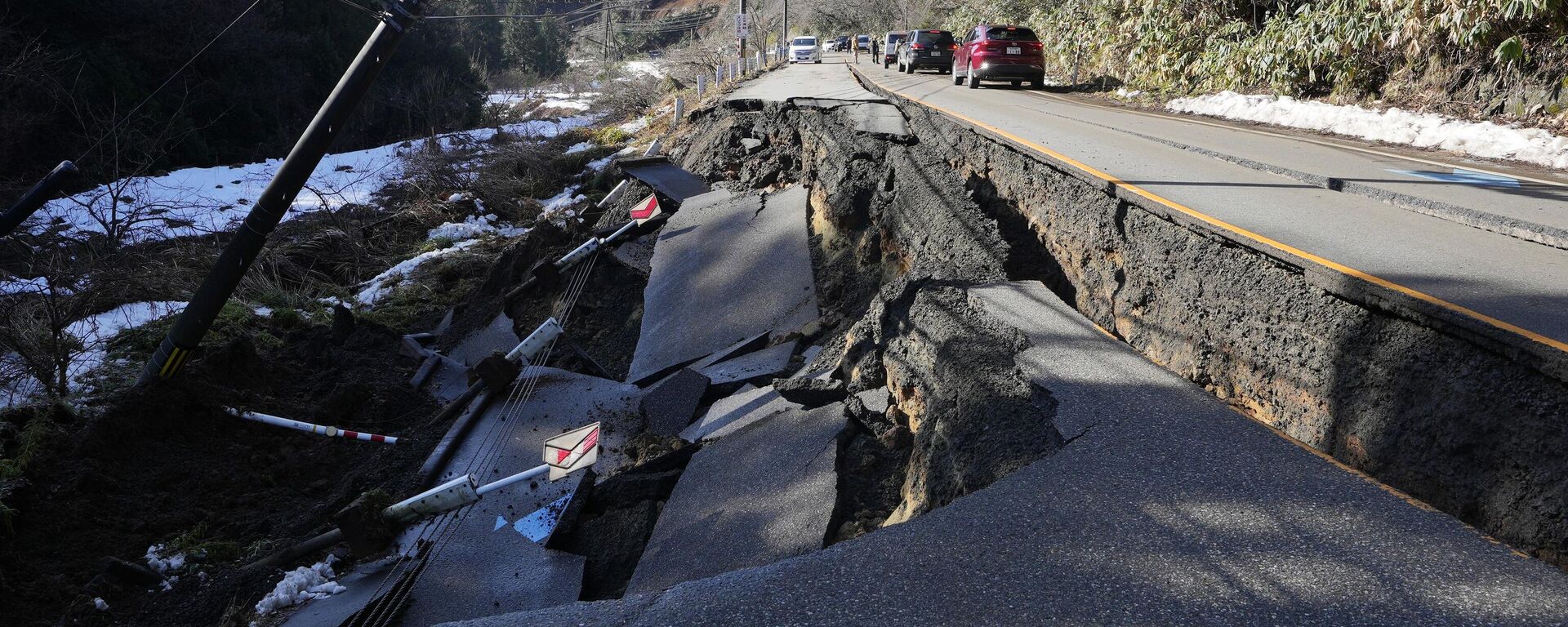 A partially collapsed road affected by landslide caused by a powerful earthquake is seen near Anamizu Town, Ishikawa Prefecture, Tuesday, Jan. 2, 2024. - Sputnik Africa, 1920, 02.01.2024