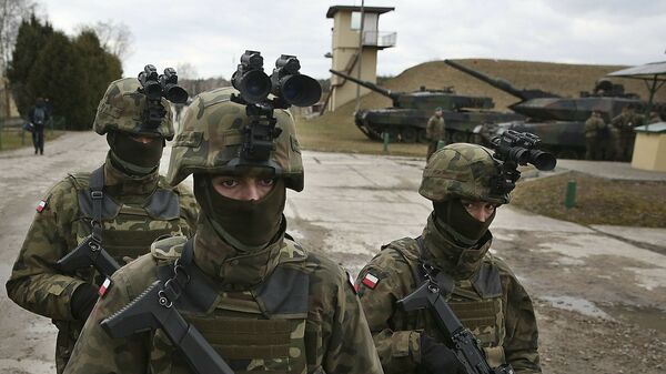 In this photo taken March 10, 2019, in Wesola,near Warsaw, central Poland, are seen Polish troops in combat gear during brief exercise with some other NATO forces marking 20 years since Poland, the Czech Republic and Hungary joined the Western military alliance - Sputnik Africa