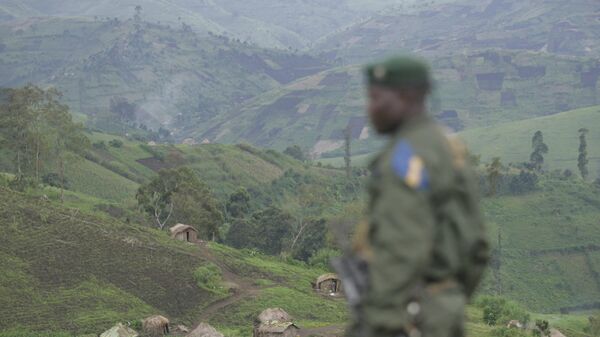 A Congolese government solder looks on in Masisi, Congo, Wednesday, Nov. 21, 2007.  - Sputnik Africa
