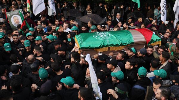 Mourners carry the coffin of Hamas' deputy leader, Saleh al-Aruri (portrait-R), killed on January 2 in a strike in Beirut's southern suburbs, during his funeral procession in Lebanon's capital on January 4. Lebanese authorities and Hamas accused Israel of killing Hamas leader al-Aruri and other officials, with Lebanese state media saying they died in a drone strike.  - Sputnik Africa
