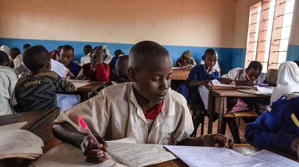 A student takes notes in a classroom at the Msomera primary school in Handeni, Tanzania, on July 15, 2022.  - Sputnik Africa