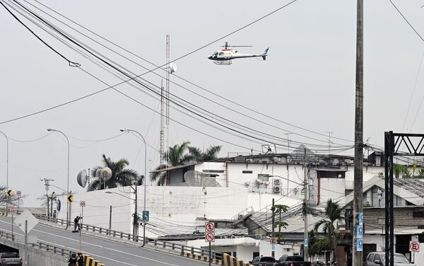 An Ecuadorean police helicopter overflies the premises of Ecuador&#x27;s TC television channel after unidentified gunmen burst into the state-owned television studio live on air on January 9, 2024, in Guayaquil, Ecuador, a day after Ecuadorean President Daniel Noboa declared a state of emergency following the escape from prison of a dangerous narco boss. - Sputnik Africa