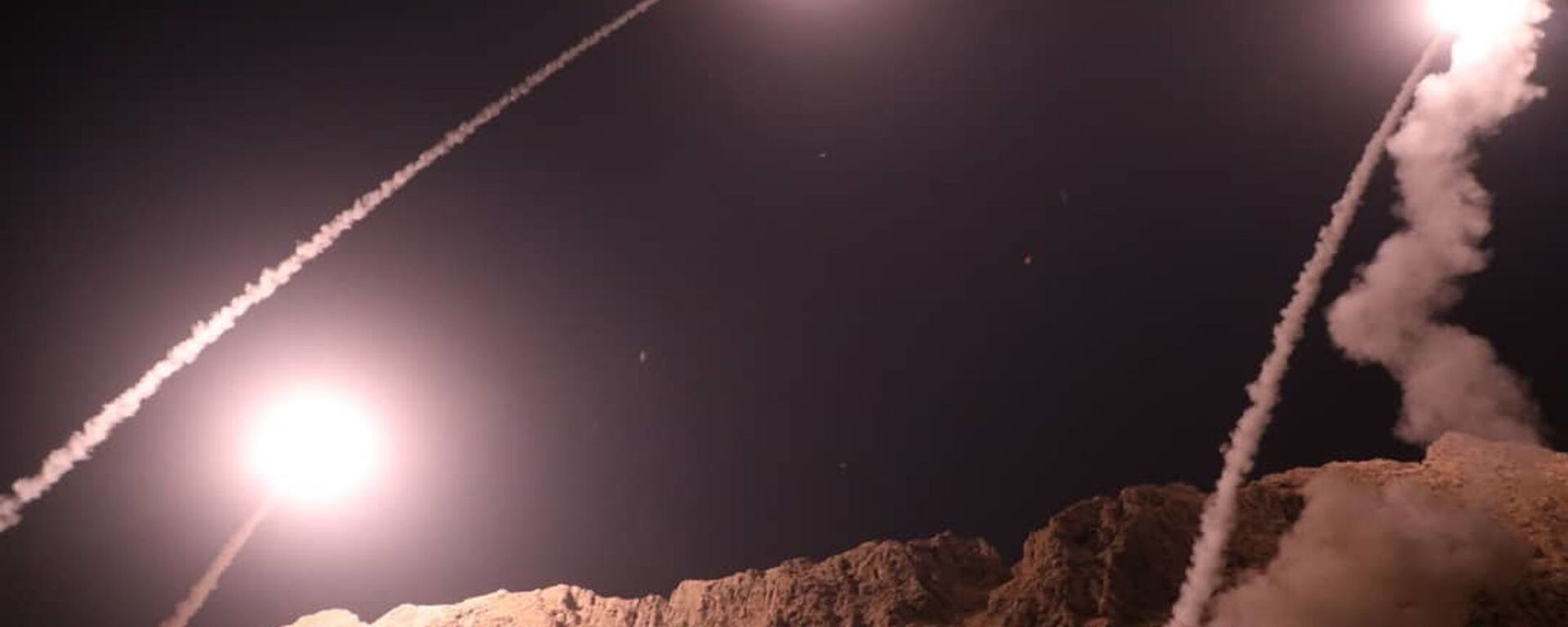 In this photo released on Monday, Oct. 1, 2018, by the Iranian Revolutionary Guard, missiles are fired from city of Kermanshah in western Iran targeting the Islamic State group in Syria. - Sputnik Africa, 1920, 16.01.2024