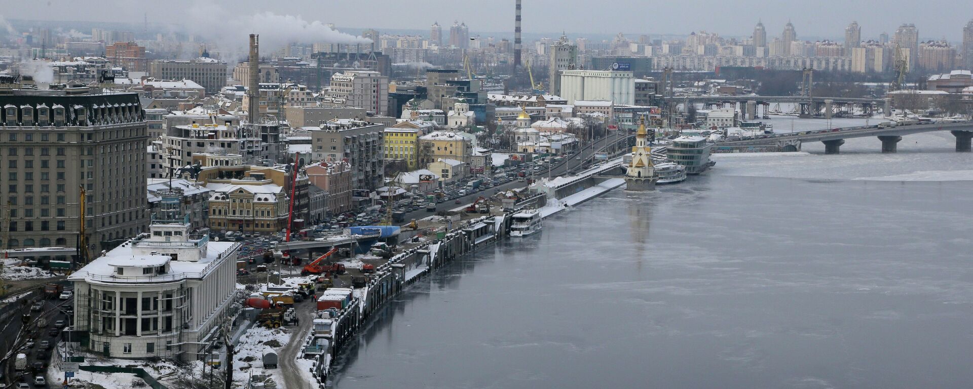 An aerial view of the right bank of the Dnieper River in the Ukrainian capital Kiev on a snowy winters day Thursday, Dec. 20, 2012 - Sputnik Africa, 1920, 22.01.2024