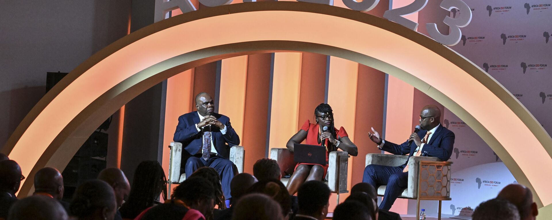 Benedict Oramah (L), president and chairman of Afreximbank, and Wamkele Mene (L), Secretary General of African Continental Free Trade Area (AfCFTA) attend a panel discussion at the 2023 Africa CEO Forum in Abidjan on June 6, 2023.  - Sputnik Africa, 1920, 28.01.2024