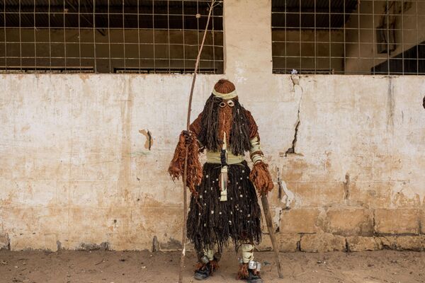 A masquerade from the Fula tribe is seen during the Kankurang Festival in Janjanbureh on January 27, 2024. - Sputnik Africa